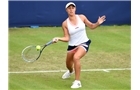 BIRMINGHAM, ENGLAND - JUNE 09:  Tamira Paszek of Austria returns a shot from Lauren Davis of United States on day one of the AEGON Classic Tennis Tournament at Edgbaston Priory Club on June 9, 2014 in Birmingham, England.  (Photo by Tom Dulat/Getty Images)